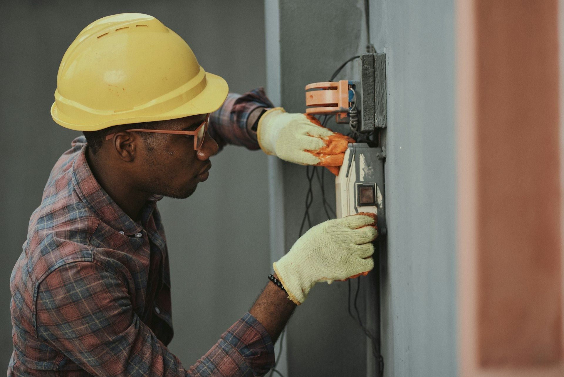 Electrician working with wires