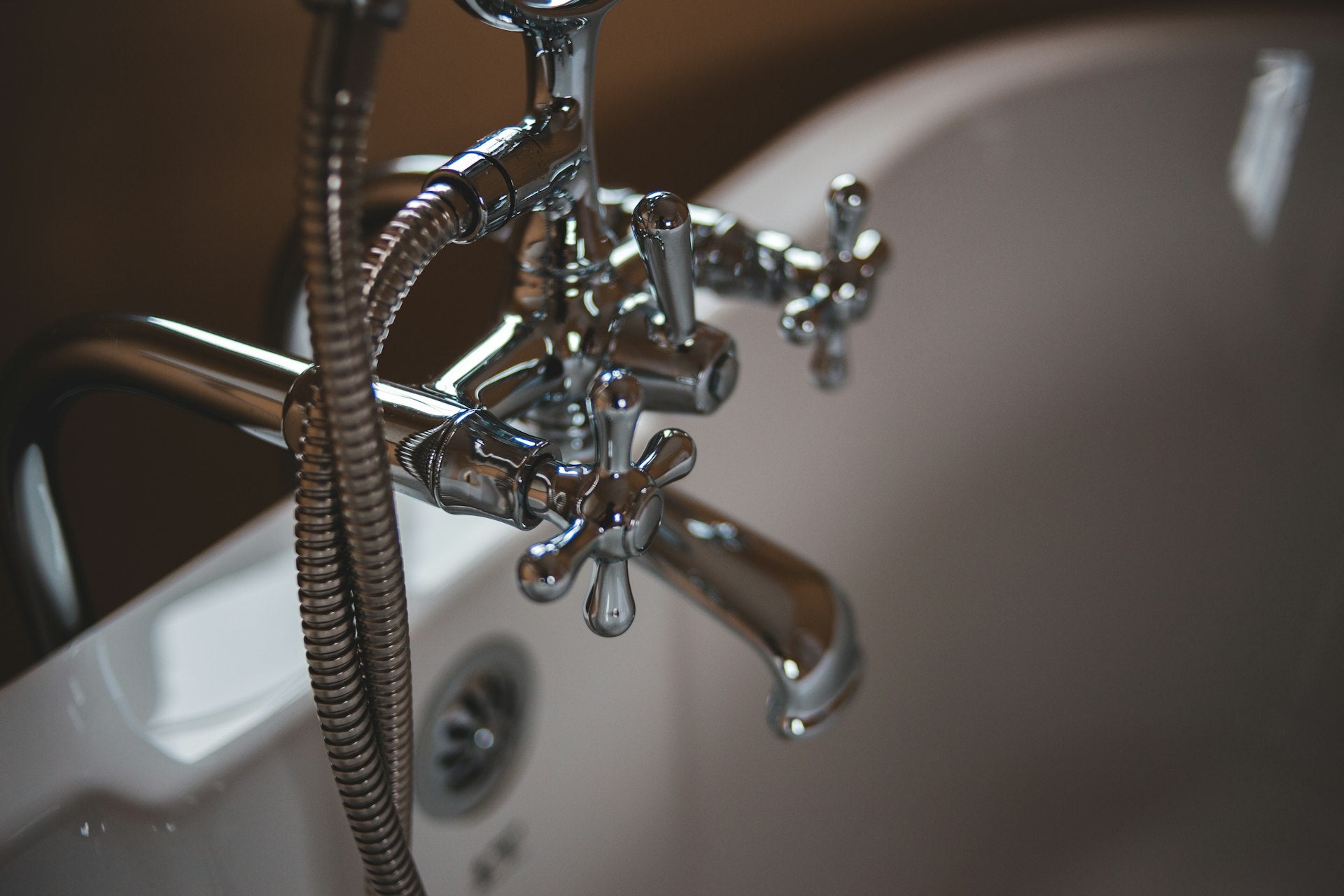 Plumber fixing pipes blue collar trade
