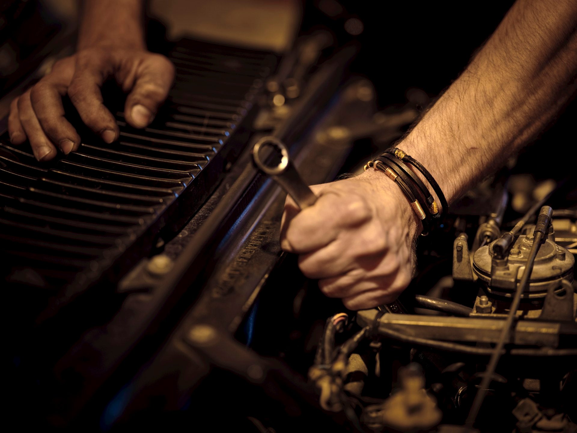 Mechanic working on engine